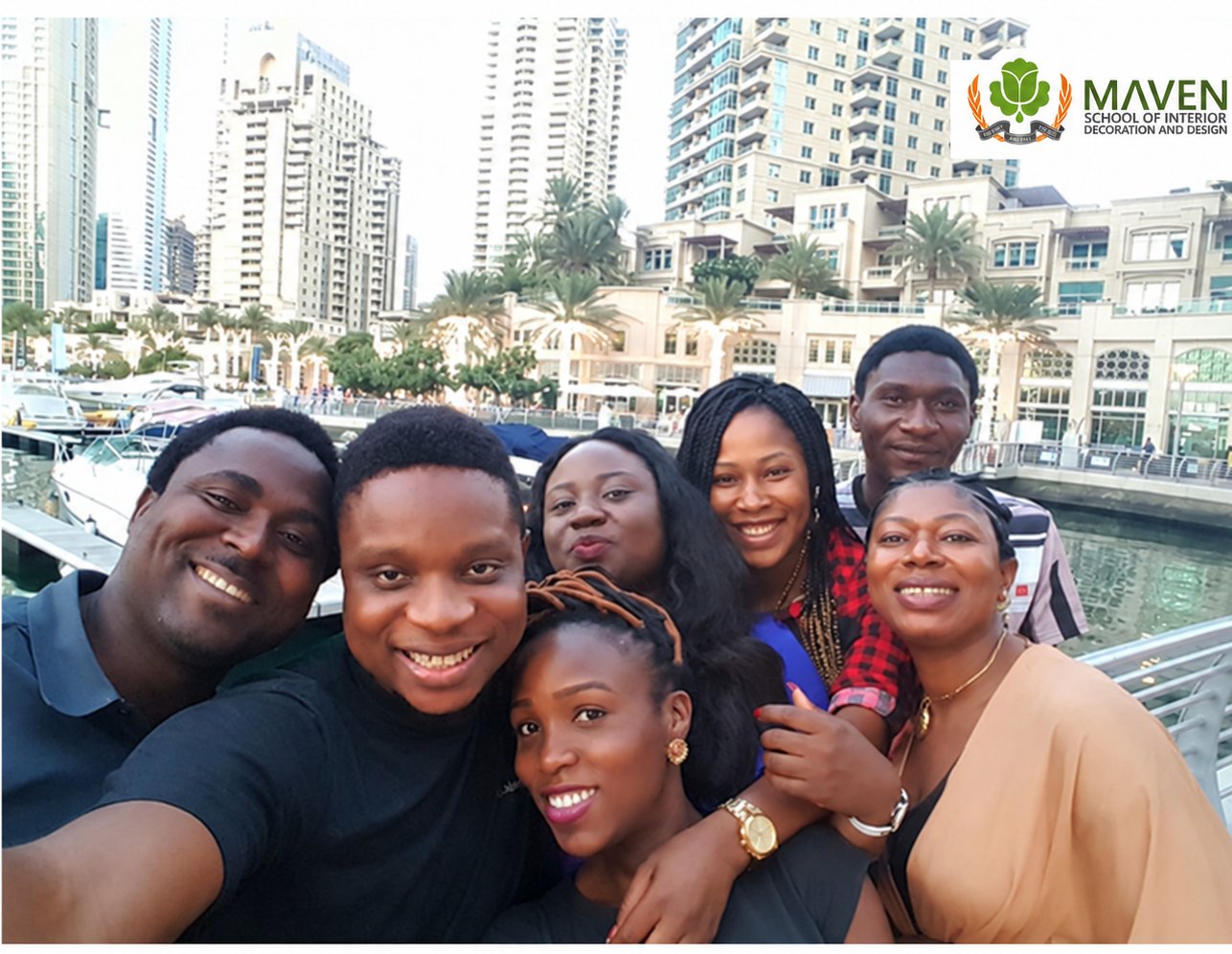 A group of Maven students together at Dubai Marina during a study excursion